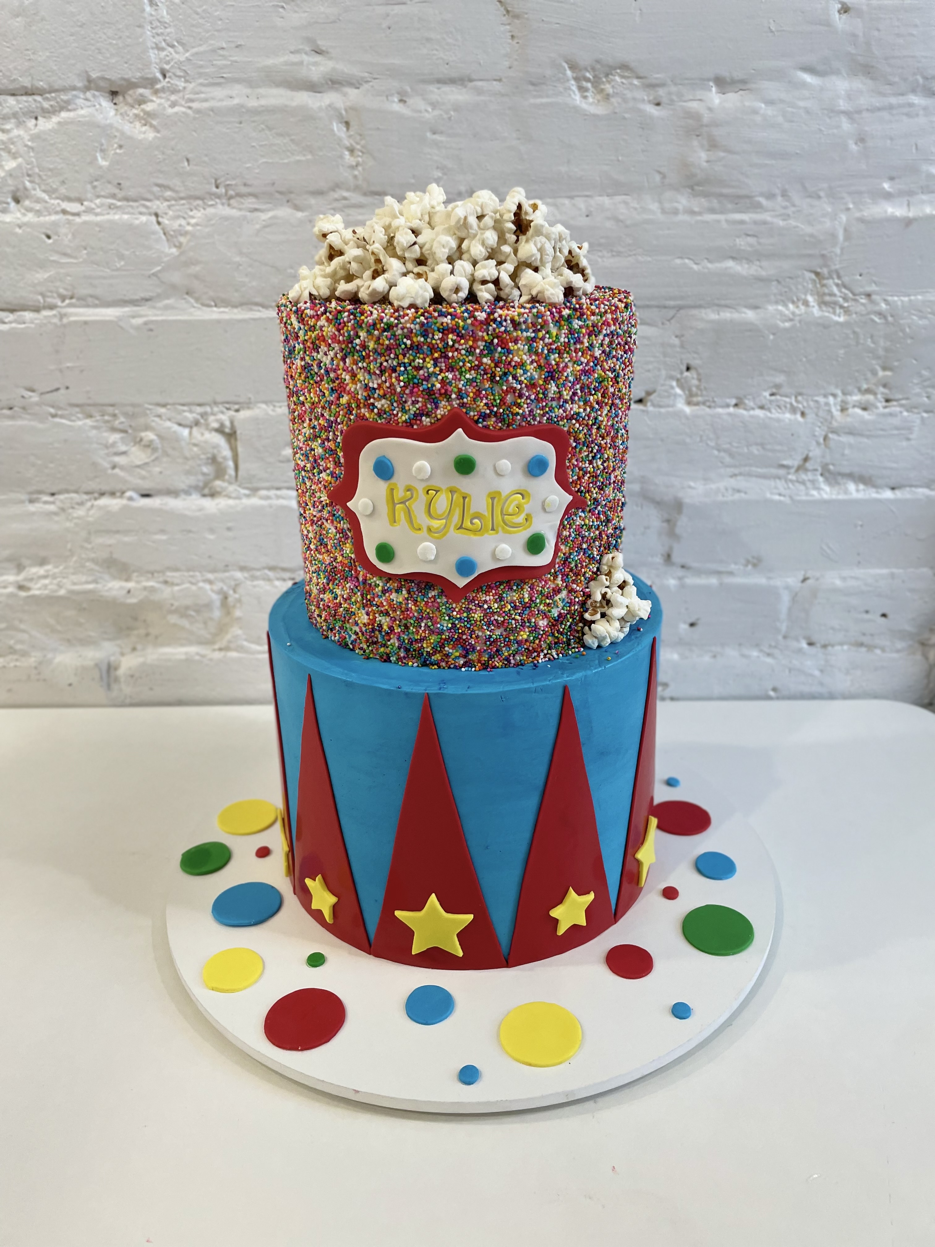 Colorful circus themed cake by Sugary Dreams