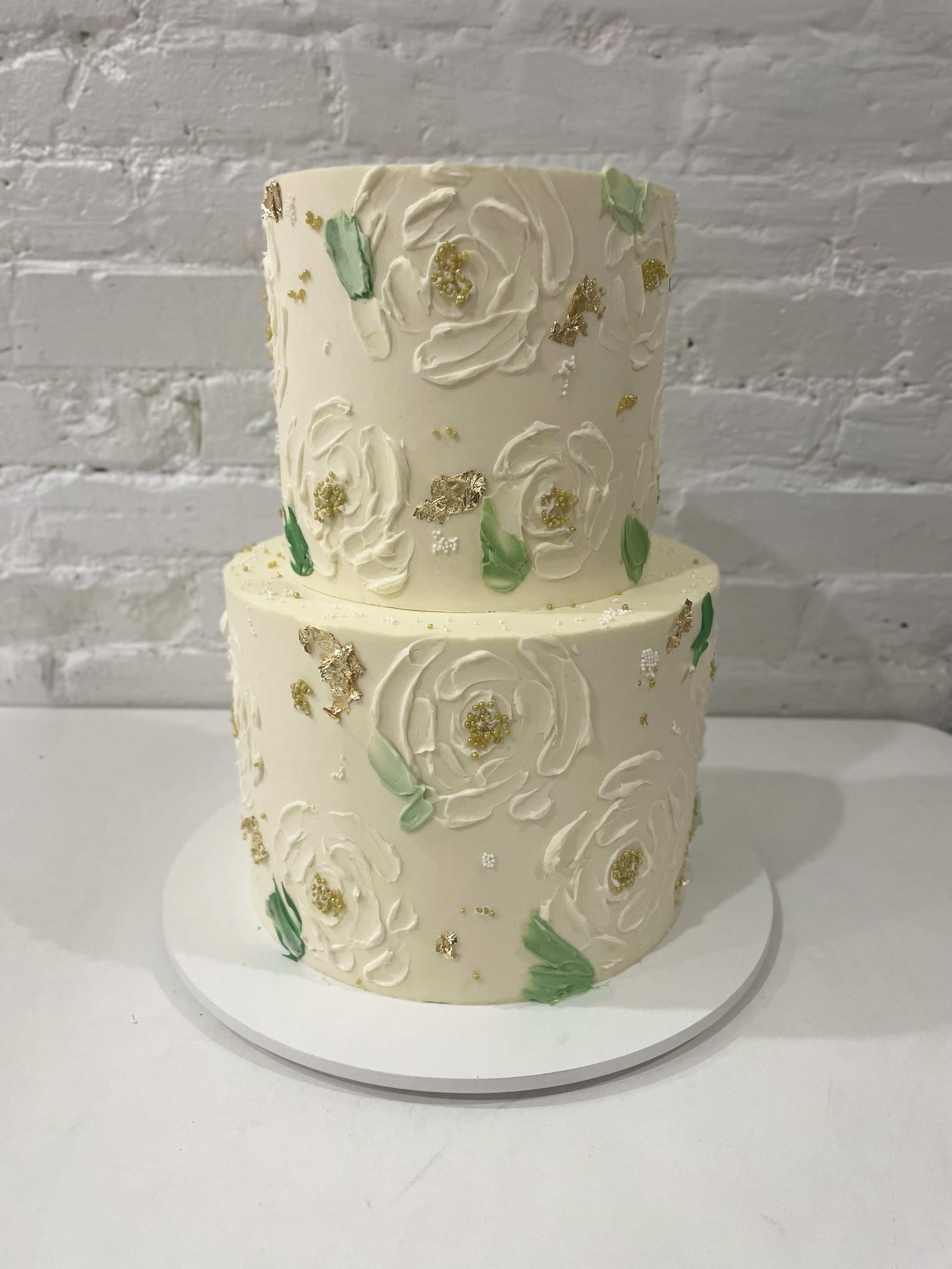Elegant two-tier floral cake by Sugary Dreams